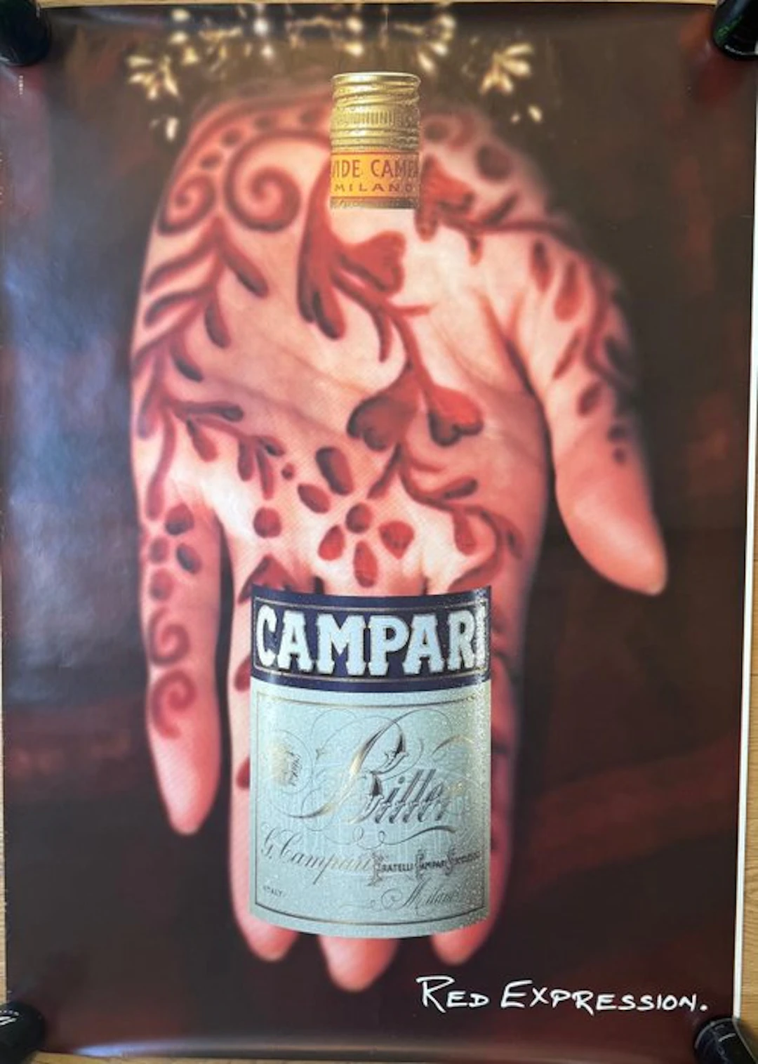 campari - red expression mano tatuata