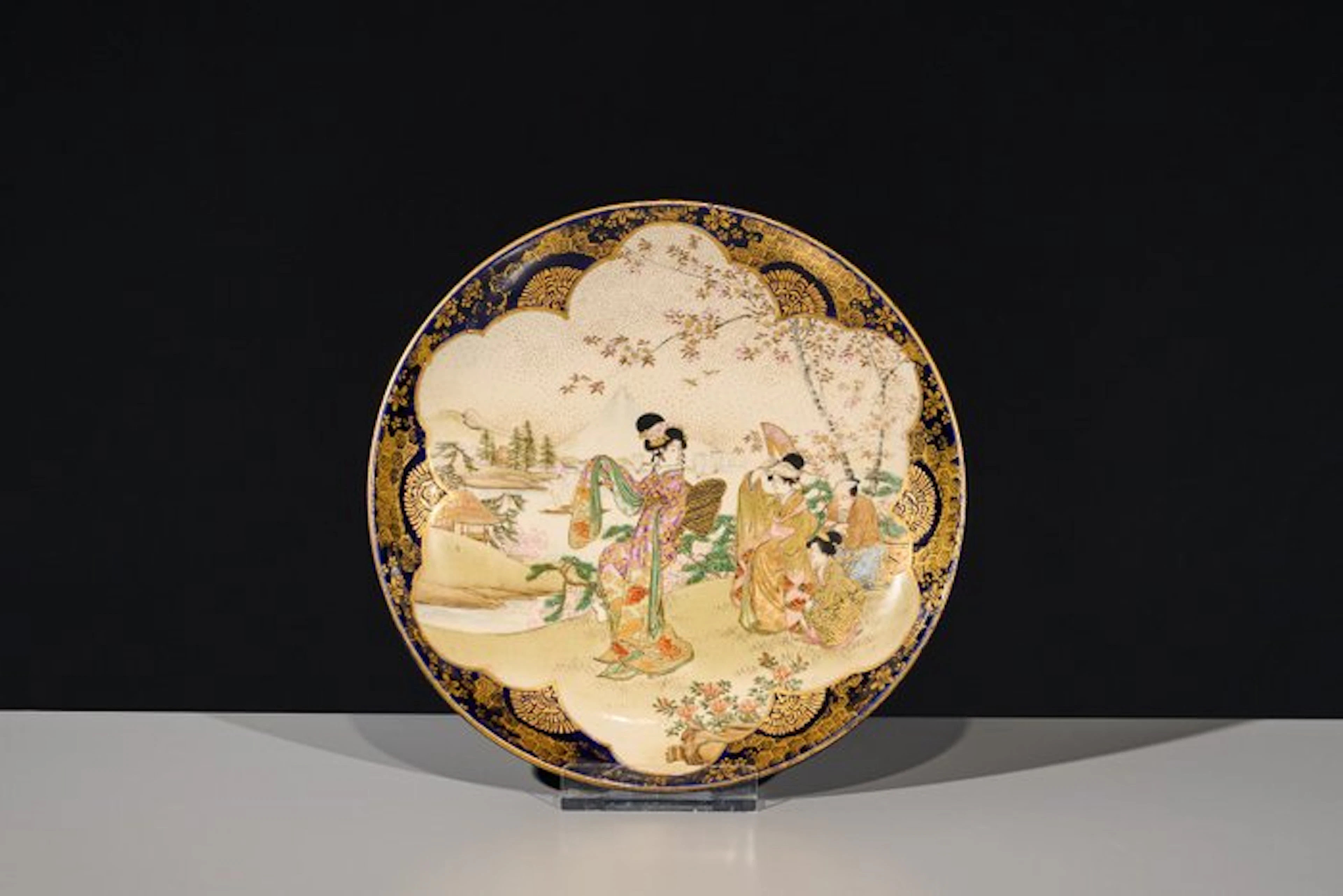 Dish - A Satsuma plate with Geishas in a cherry blossom landscape - Ceramic