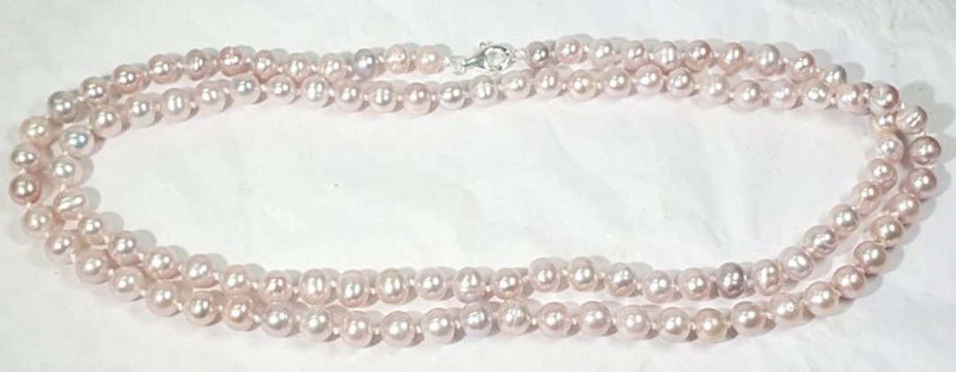 Natural pink freshwater pearls - LARGO OPERA - Symbol of...