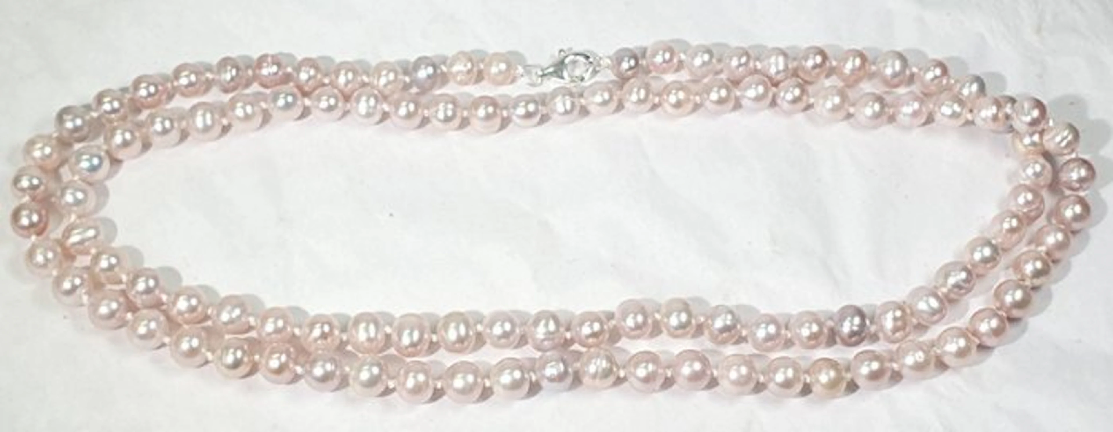 Natural pink freshwater pearls - LARGO OPERA - Symbol of...