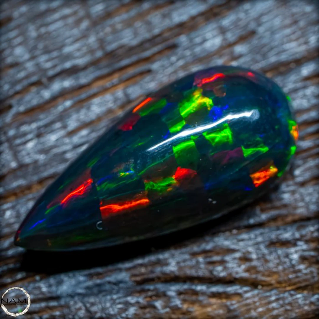 Black Opal Cabochon – Intense Play of Color in Perfected Form 9.45 ct- 1.89 g