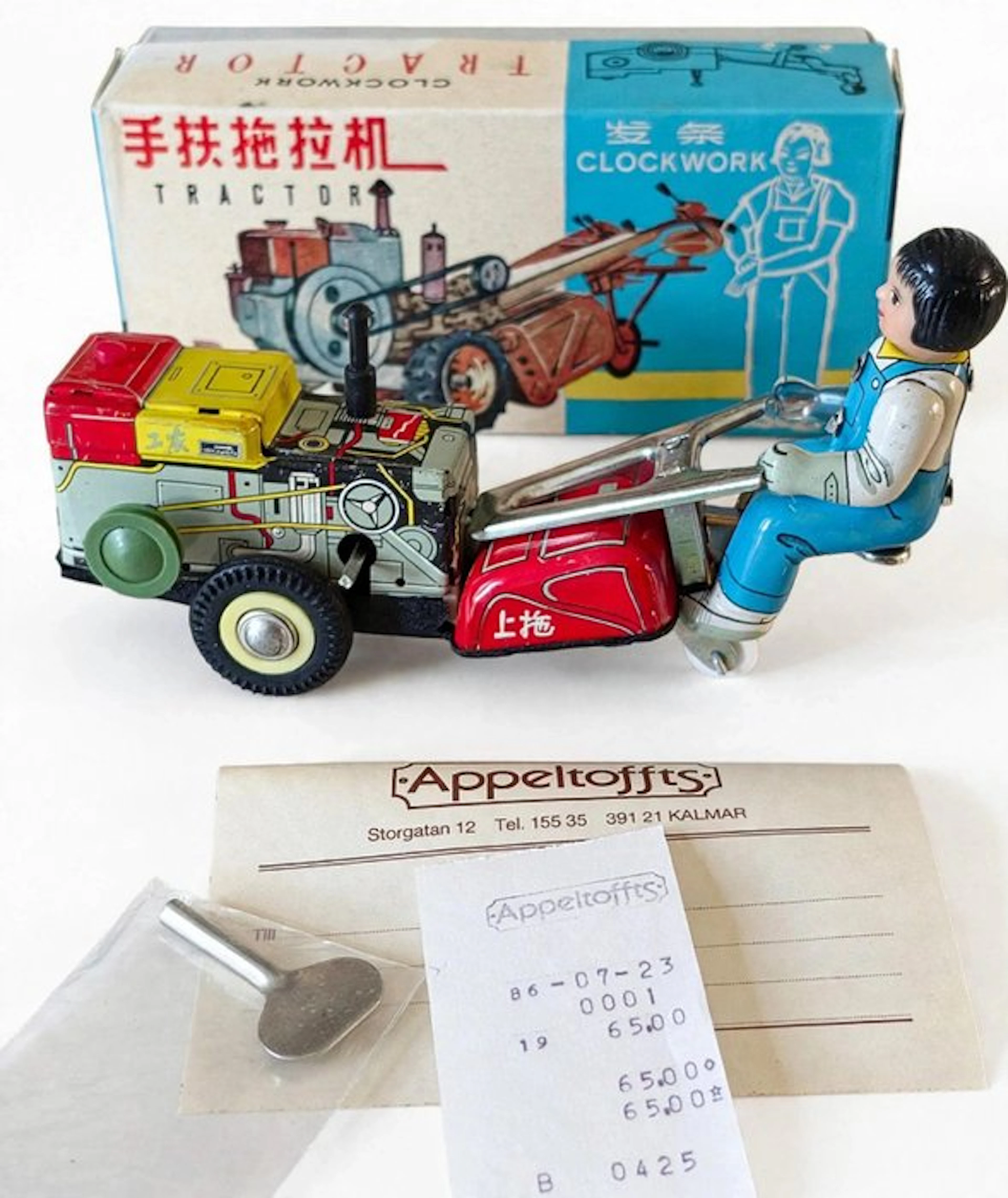 Zeldzame litho blikken handtractor met opwindsleutel en...