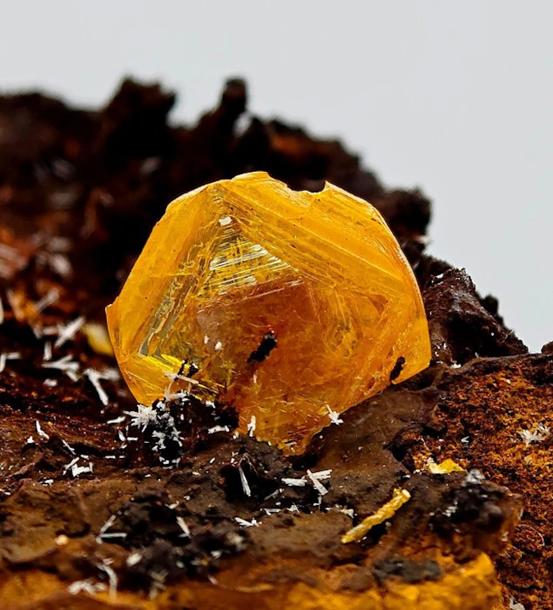 Large yellow wulfenite crystal with white willemite