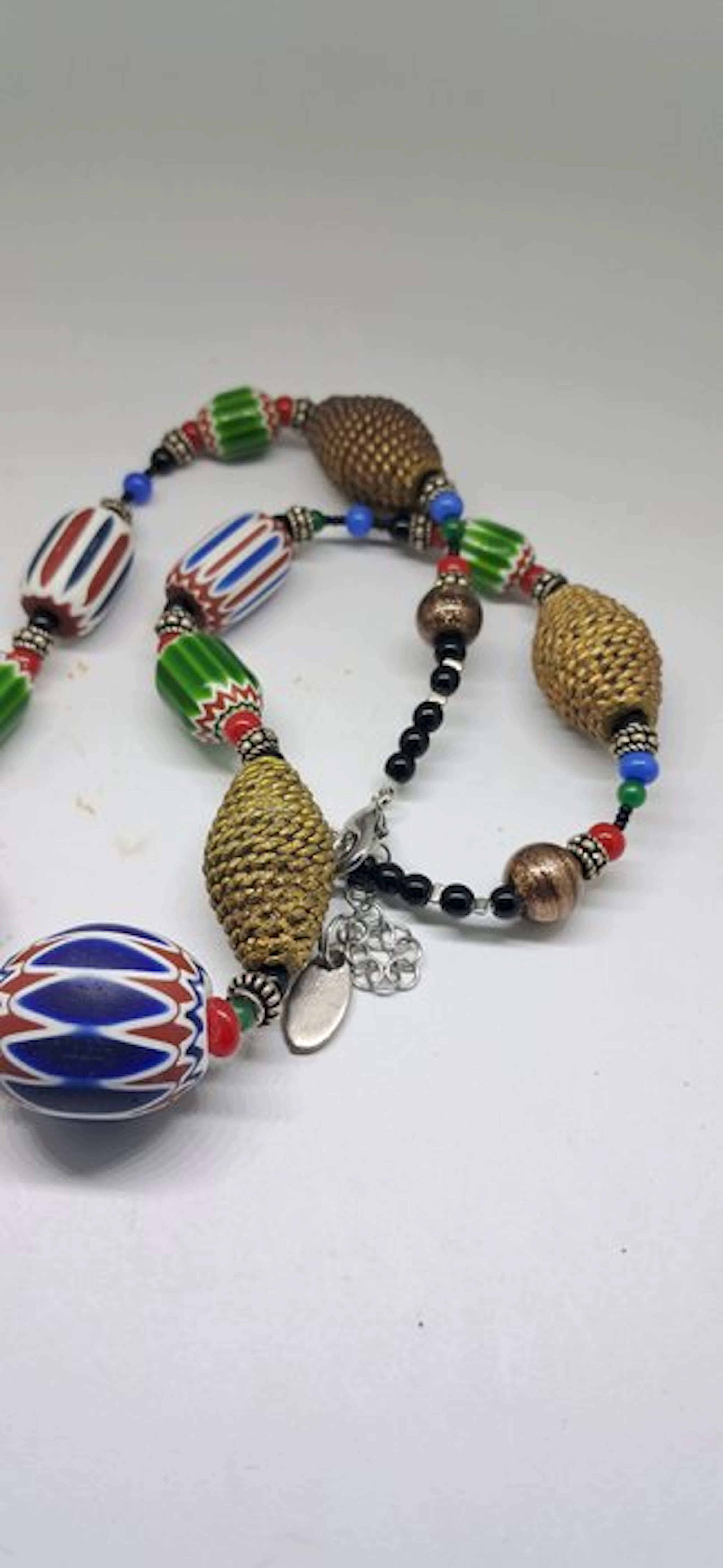 Necklace with rosette pearls and bronze. - Italy