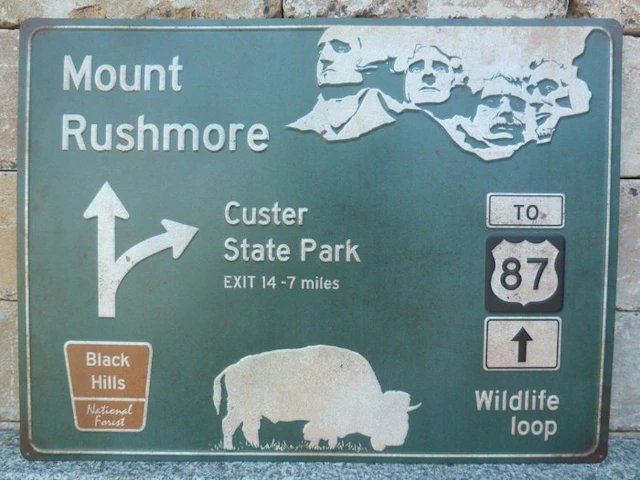 Sign - Mount Rushmore street sign - highway sign - Mount Rushmore - Yuck