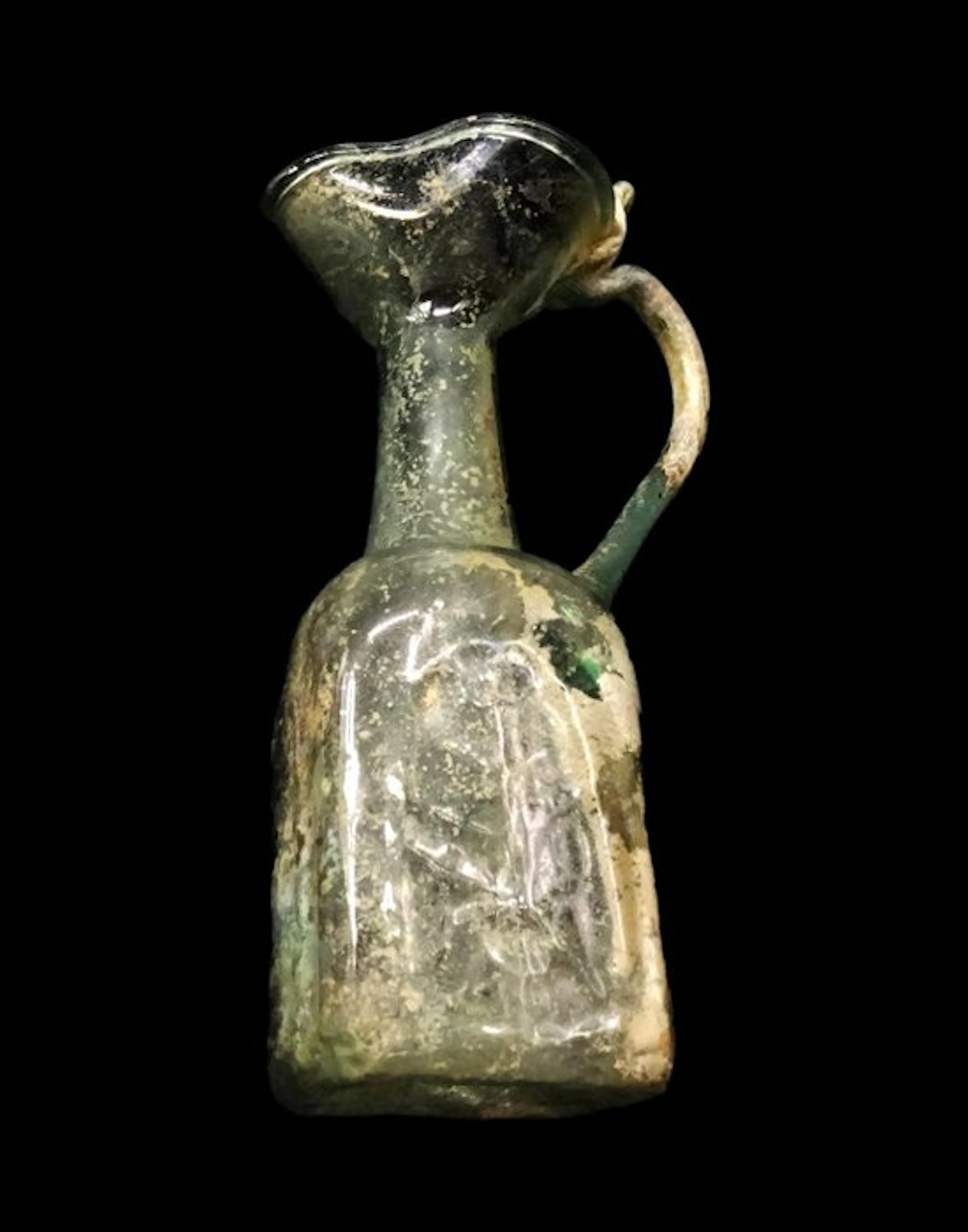 Ancient Roman - Roman glass vase with relief decoration...