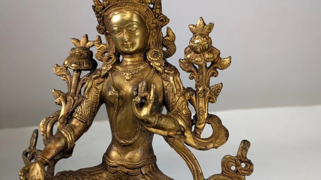 Verguld bronzen boeddhistisch standbeeld van de godin...