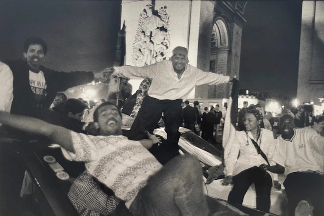 Marc Riboud (1923–2016) - Champs-Élysées. Paris, 12 juillet 1998.