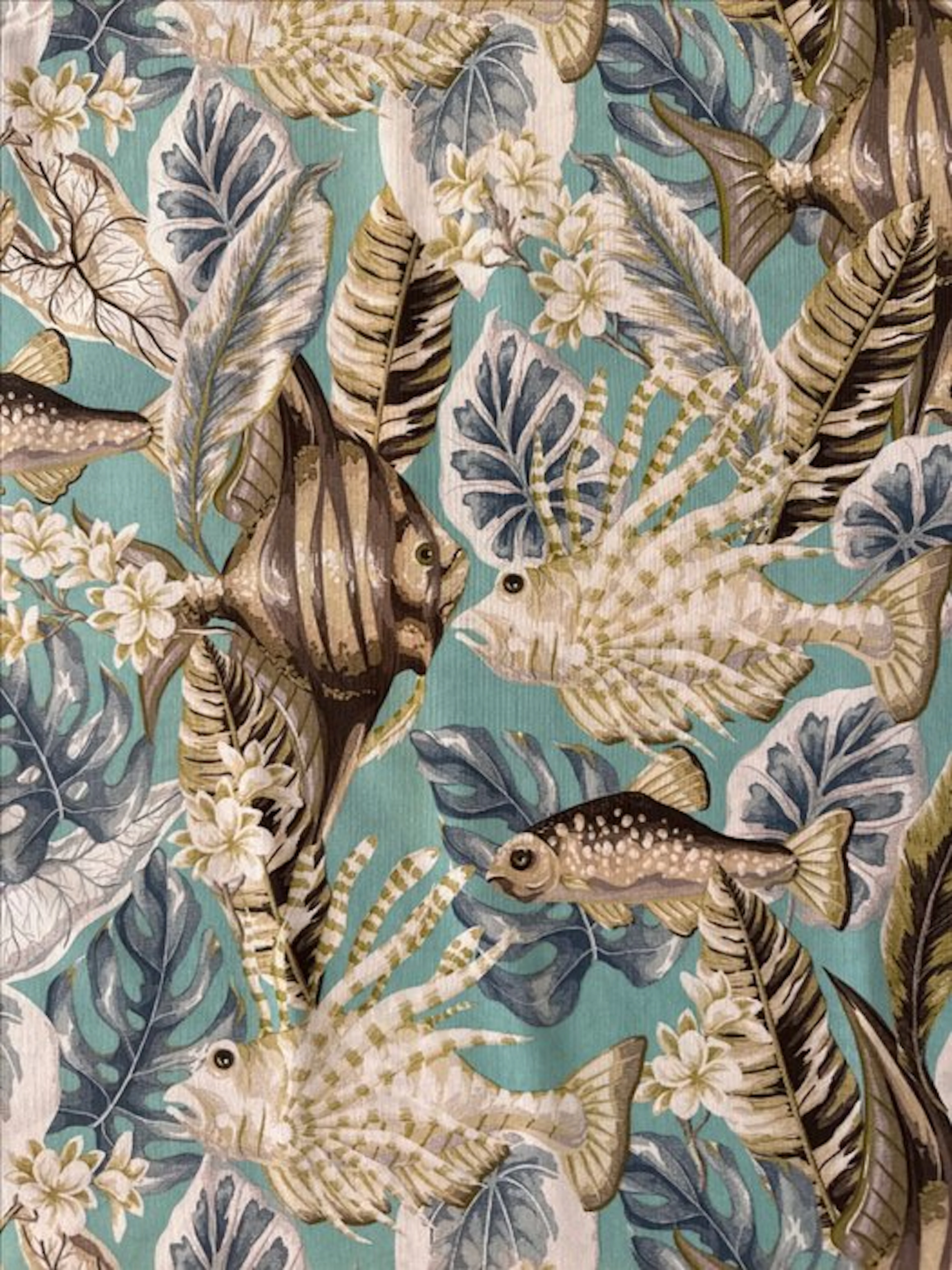 Aquamarine fabric with a Mediterranean-inspired design...