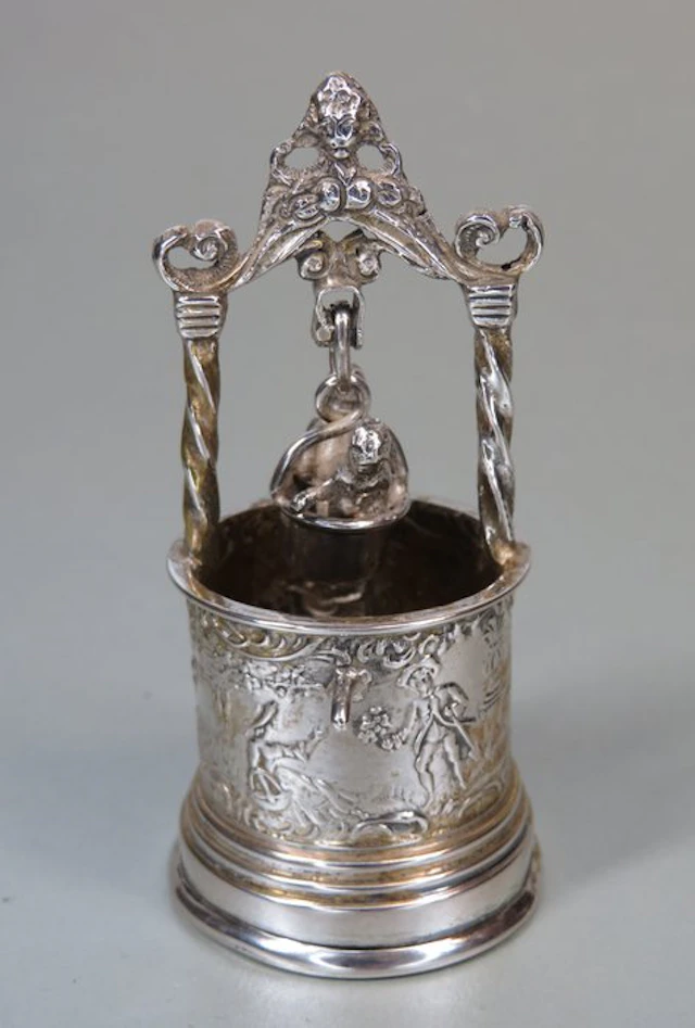 Ca 1900: Kindjes in een waterput (Simon Rosenau