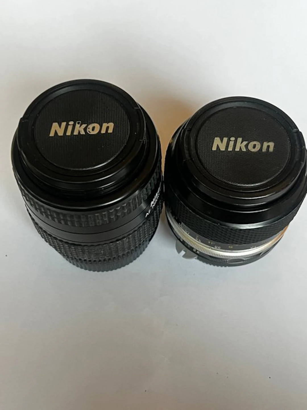 Nikon Nikkor-P.C Auto 55mm f/3.5 + AF Nikkor 28–70mm...