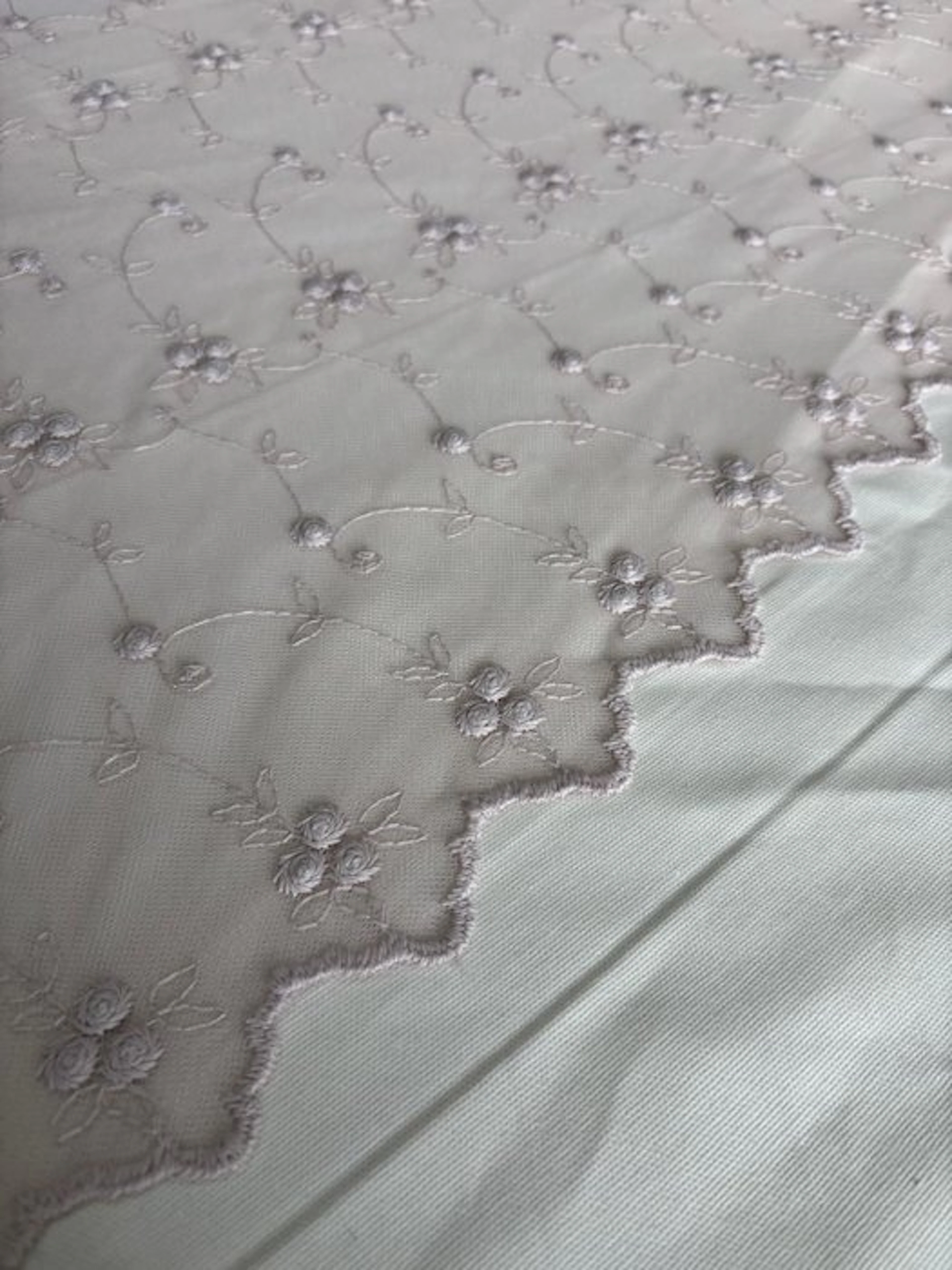 Luxurious curtain fabric: French embroidered tulle edged...