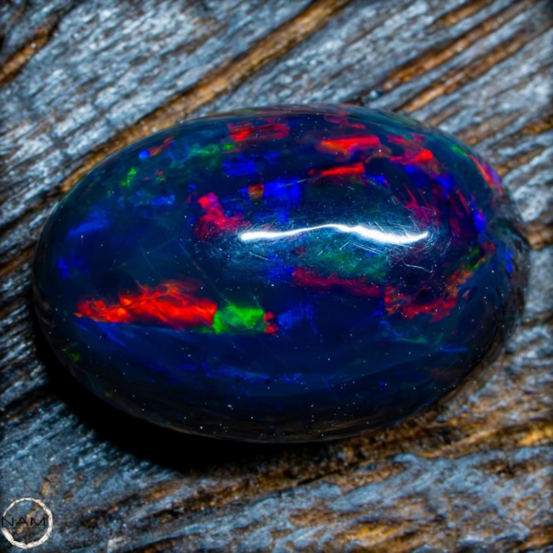 Black Opal Cabochon – Intense Play of Color in Perfect Form 4.75- 0.95 g