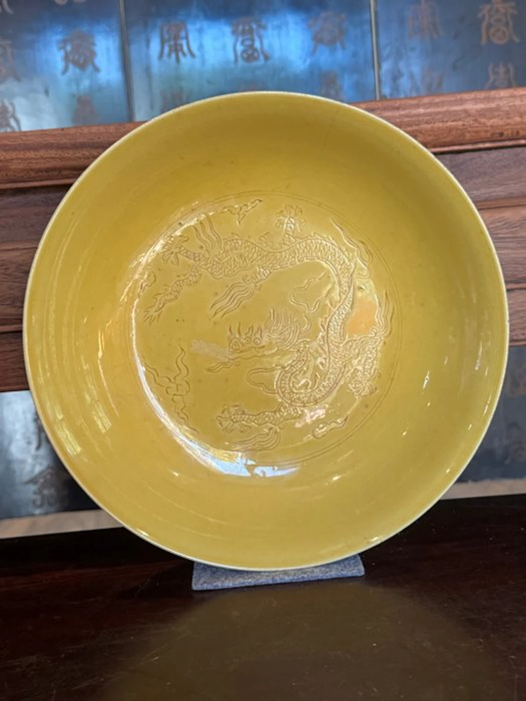 Chinese yellow‑glazed dish with incised dragon motif