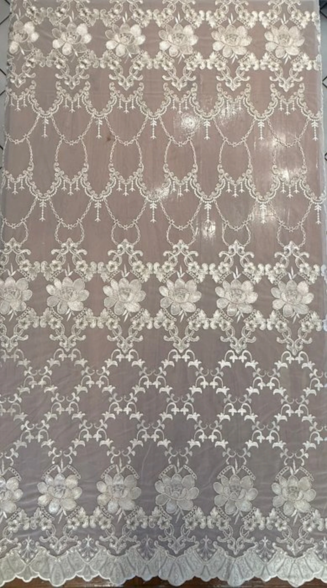 Prestigious embroidered tulle with a floral design...