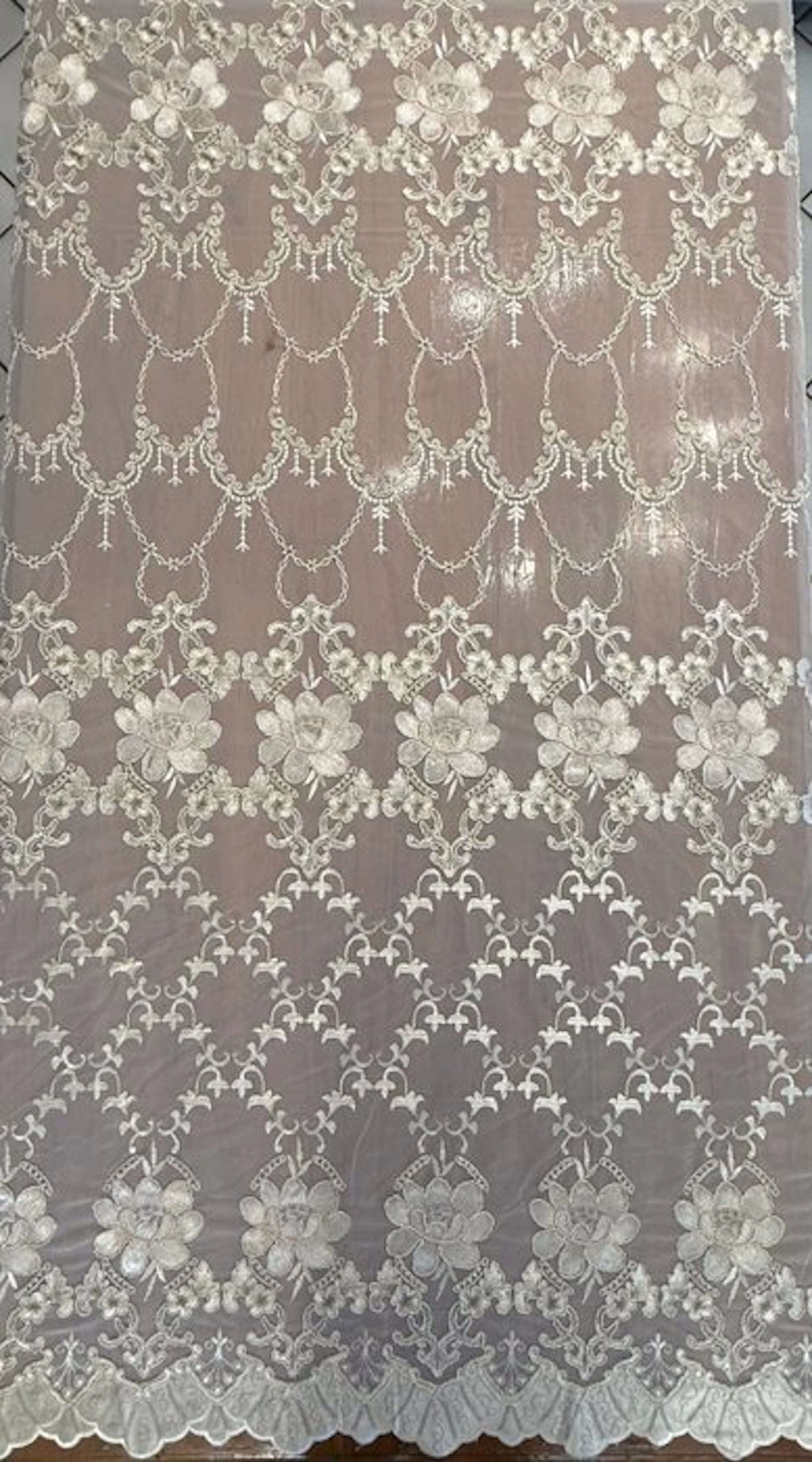 Prestigious embroidered tulle with a floral design...