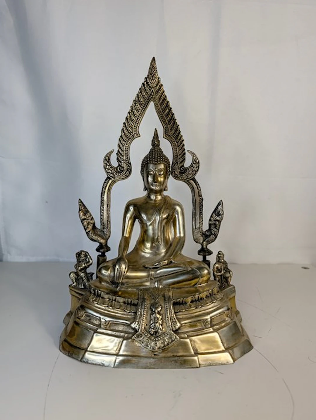 Buddha with a flaming aureole and guardian figures –...