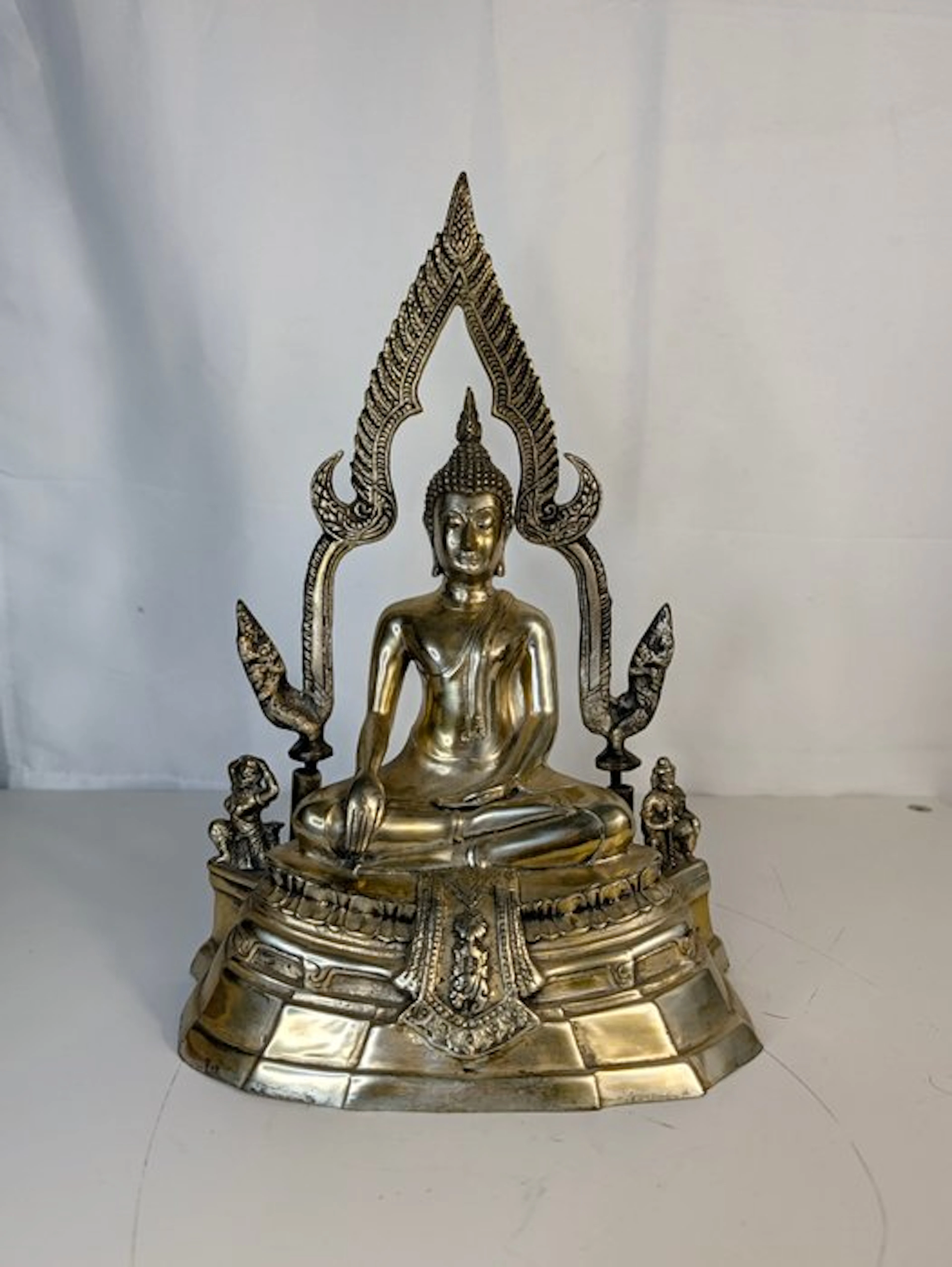 Buddha with a flaming aureole and guardian figures –...