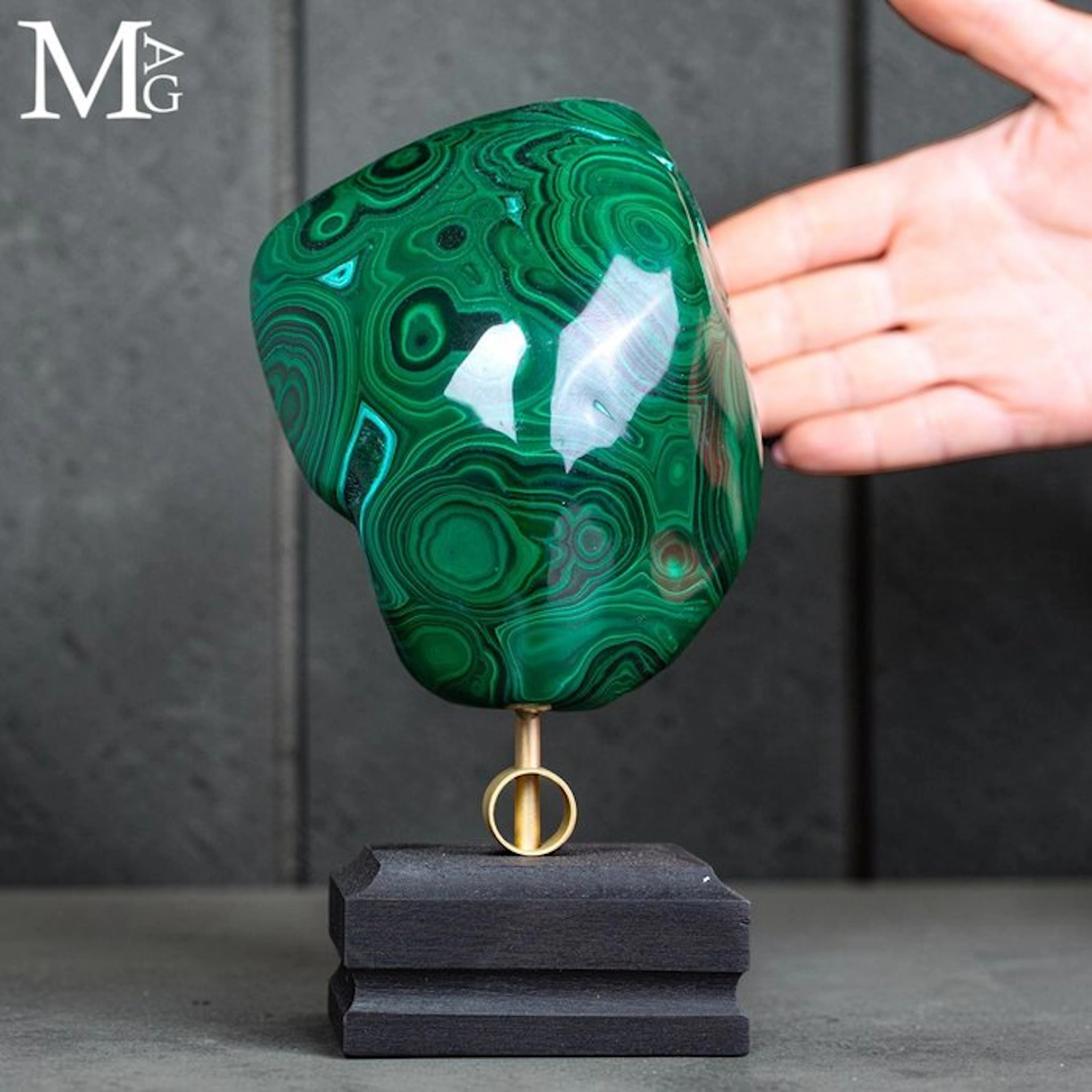 Bright green malachite with hypnotic concentric bands...