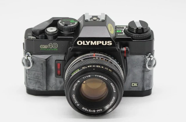 Olympus OM40 Program + F.Zuiko 50mm f/1,8 Single lens reflex camera (SLR)
