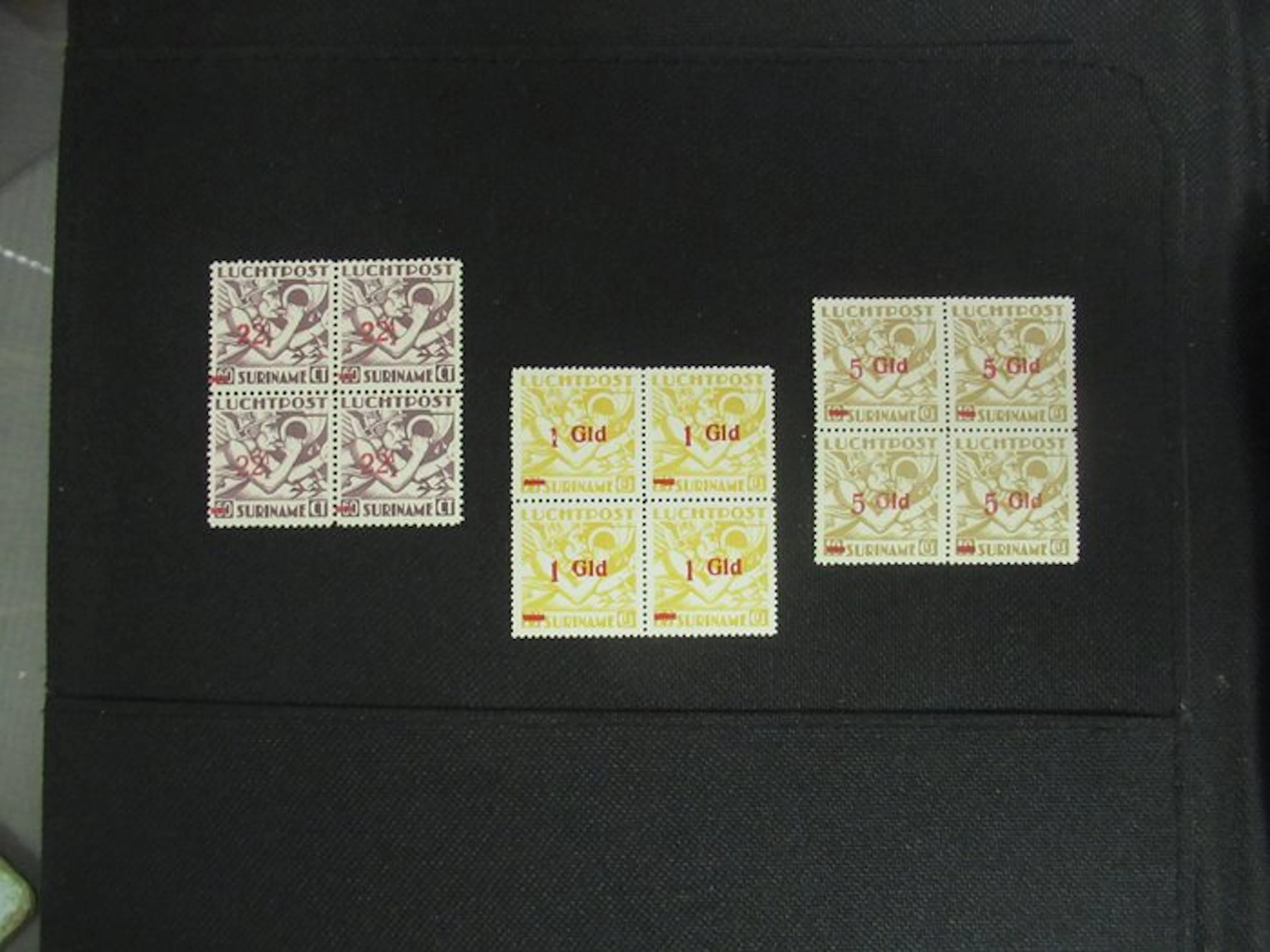 Suriname 1945 - Suriname airmail overprints in blocks of 4