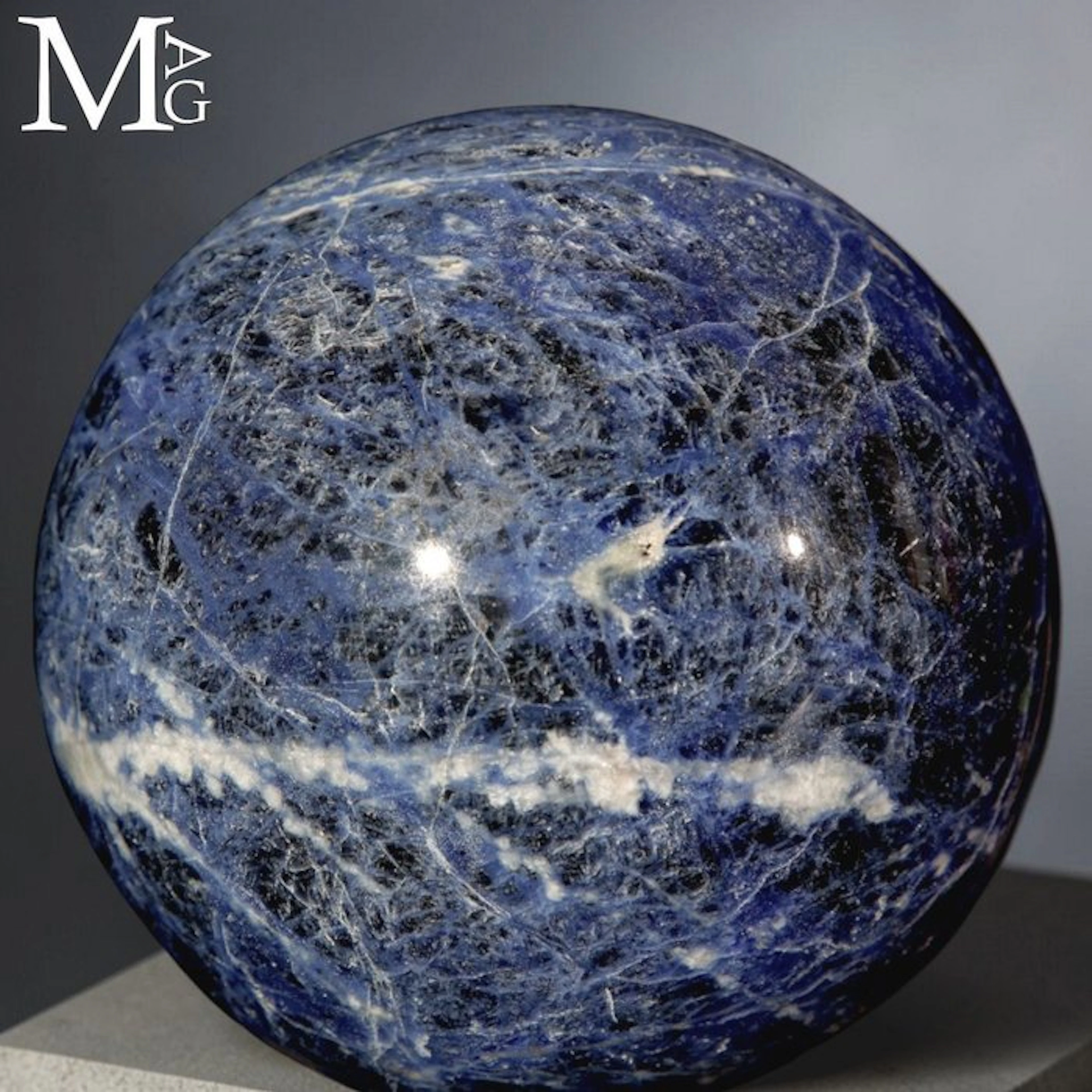 Blue Sodalite with a Striking Web of White Calcite Veins...