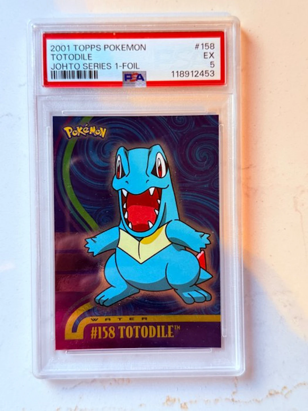 Pokémon - 1 Graded card - Totodile 158 Foil - PSA 5 - Various sets
