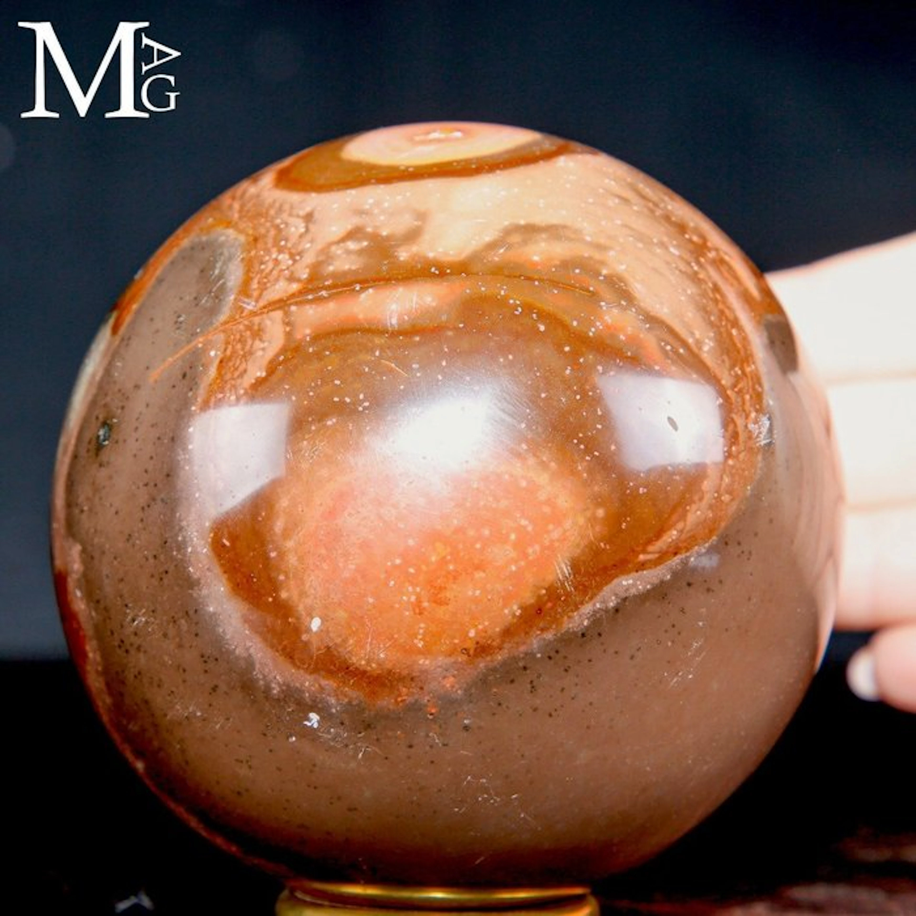 Vivid multicolored jasper with bold circular motifs...