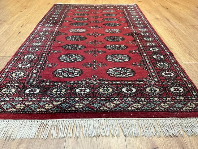 Beautiful hand-knotted Bukhara oriental rug with...