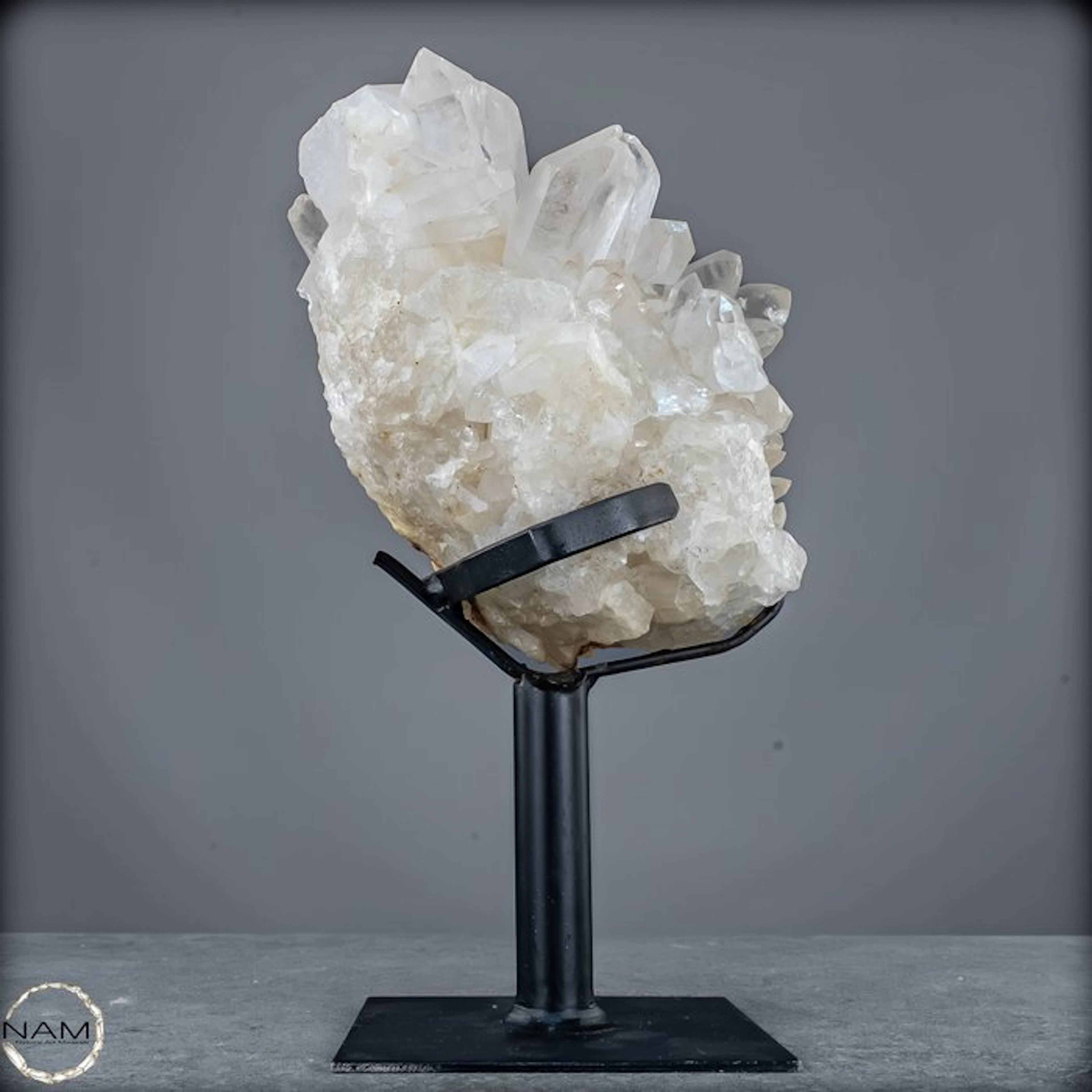 Lemurian quartz crystal step on a metal stand – natural...