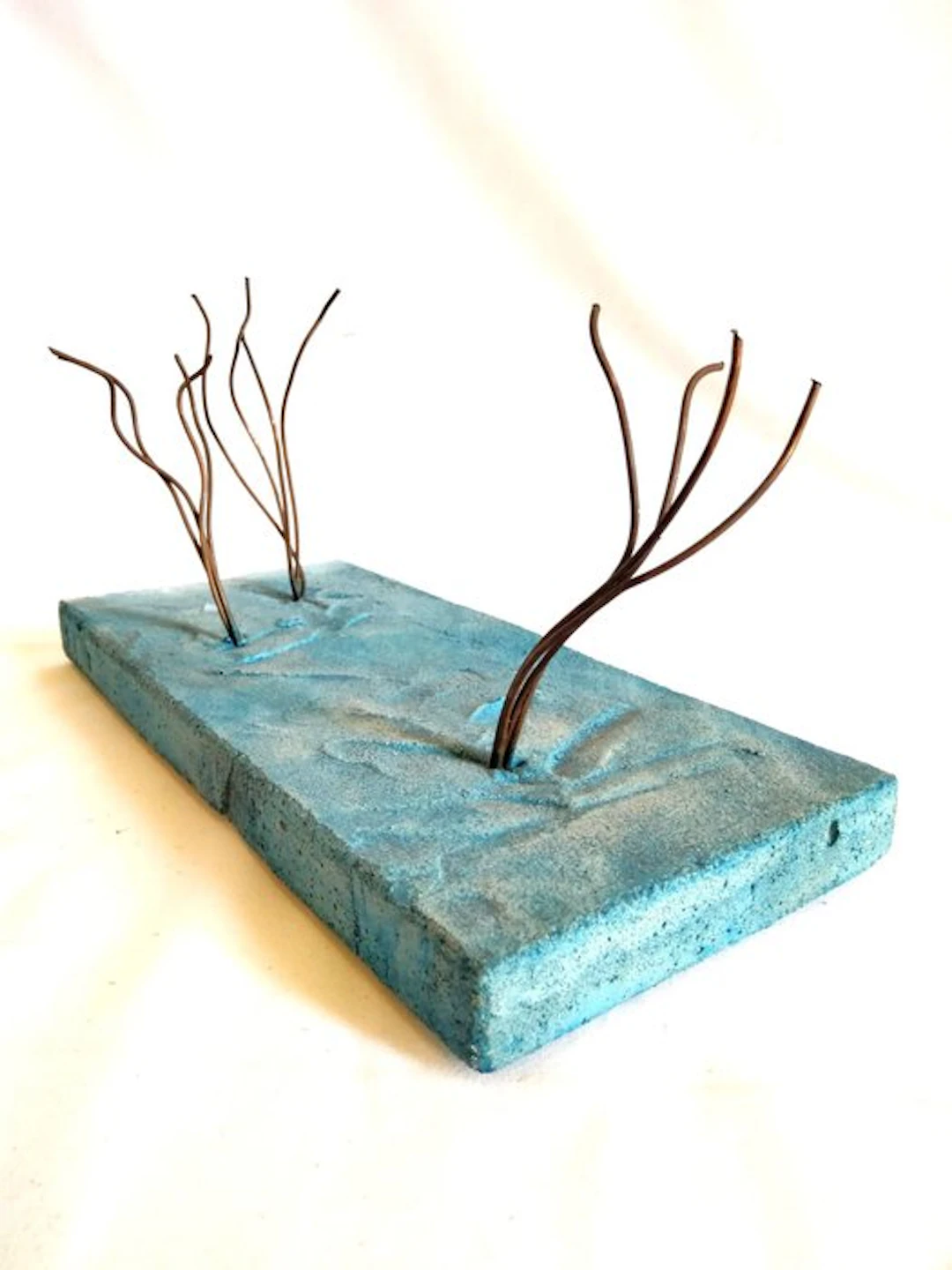 Roberto Dagnino - Centrepiece - Islands - cement, copper
