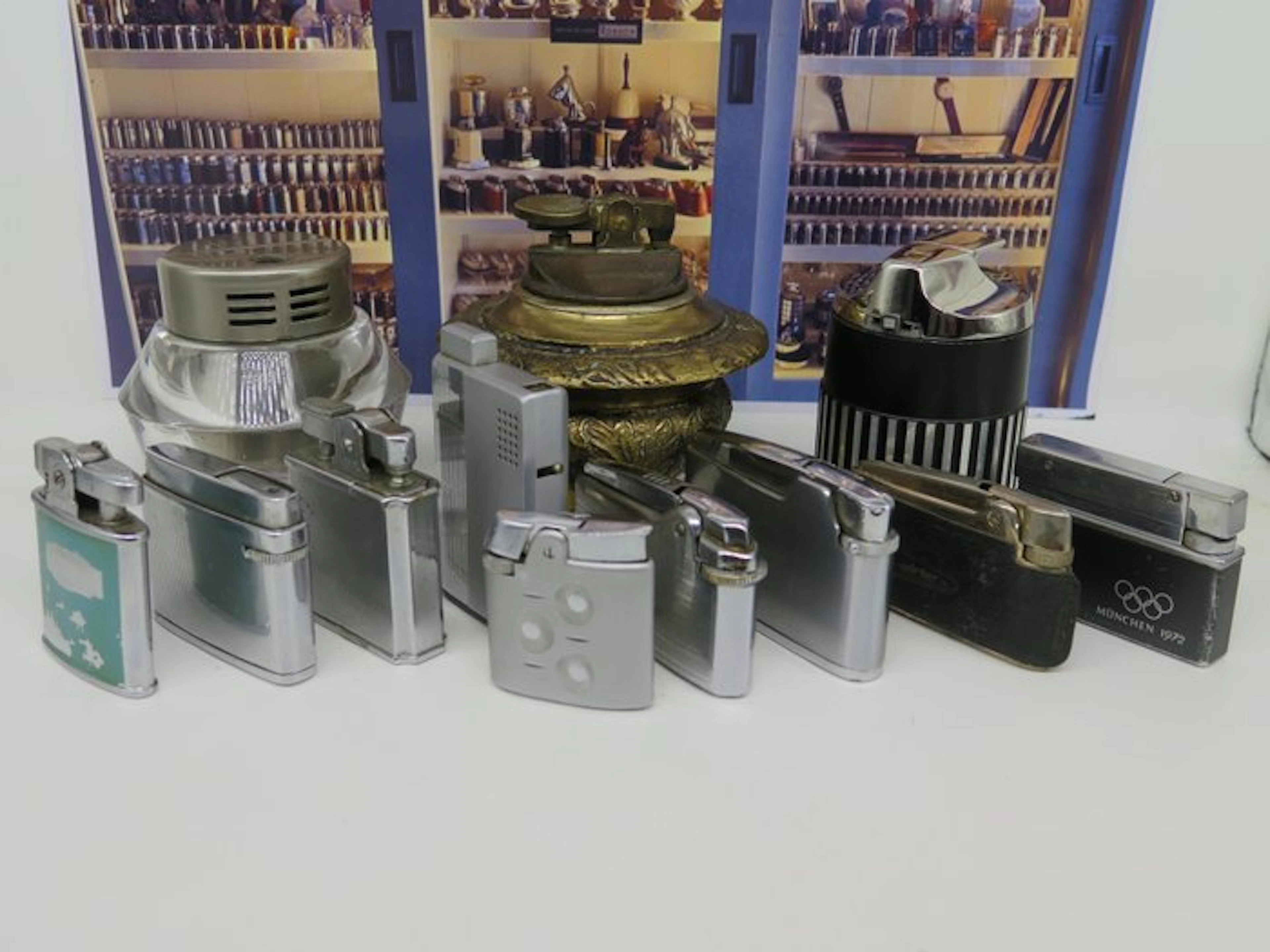 No reserve price - Lighter - Steel, Brass, Glass, Chrome, Plastic - (12)