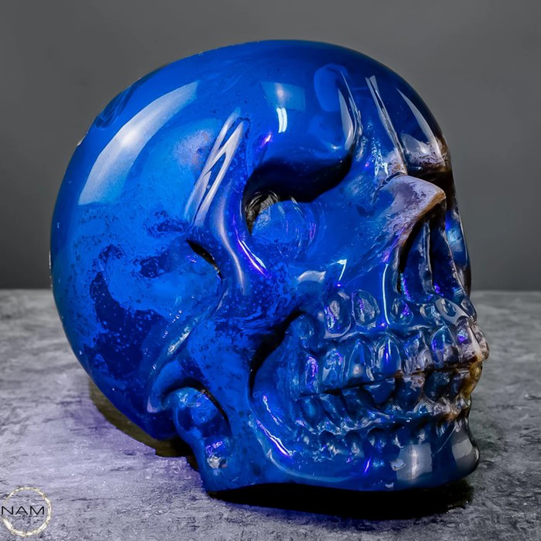 Natural Blue-Red Amber Skull- 413.98 g
