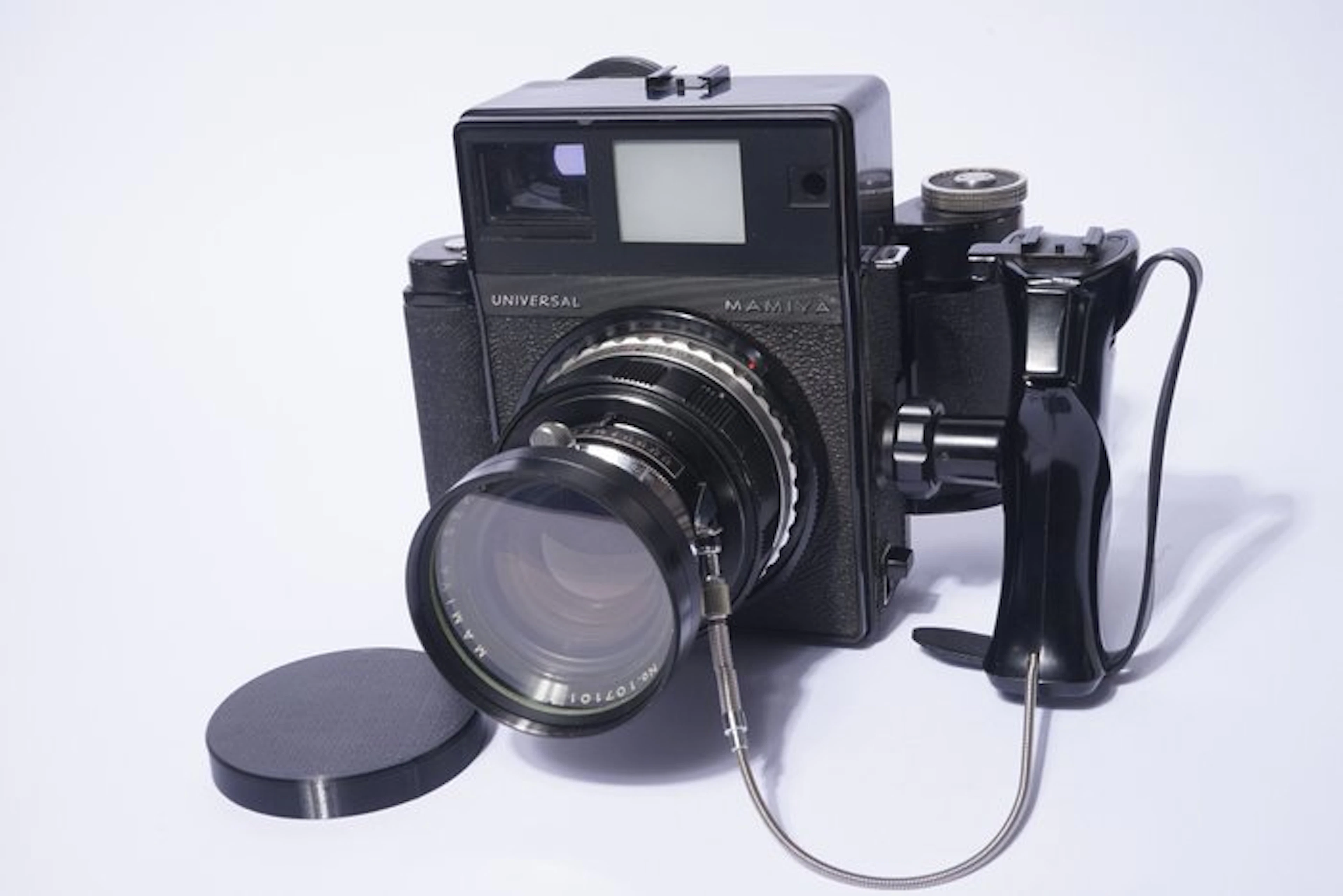 Mamiya Universal con obiettivo Sekor 100/2,8 e dorso per rullo 120-220
