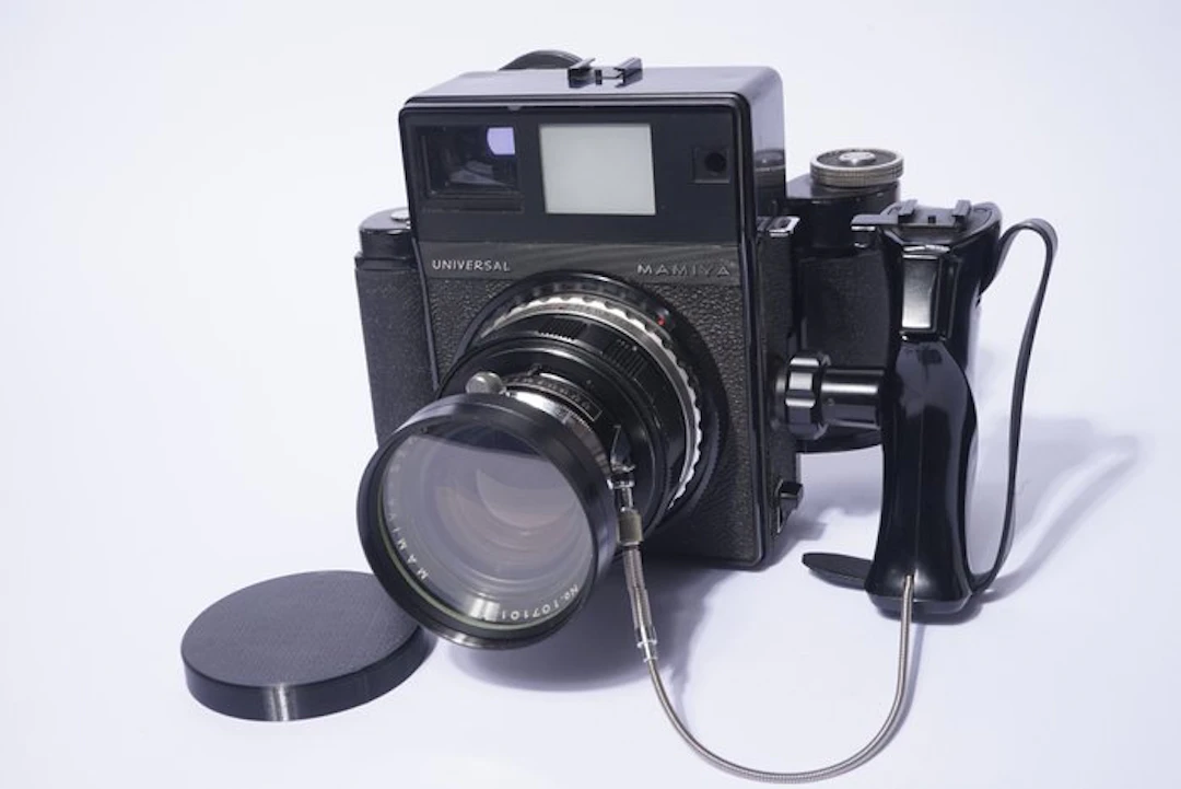 Mamiya Universal con obiettivo Sekor 100/2,8 e dorso per rullo 120-220