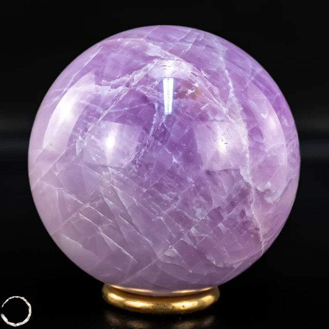 Majestic kunzit sphere with a captivating cat's eye...