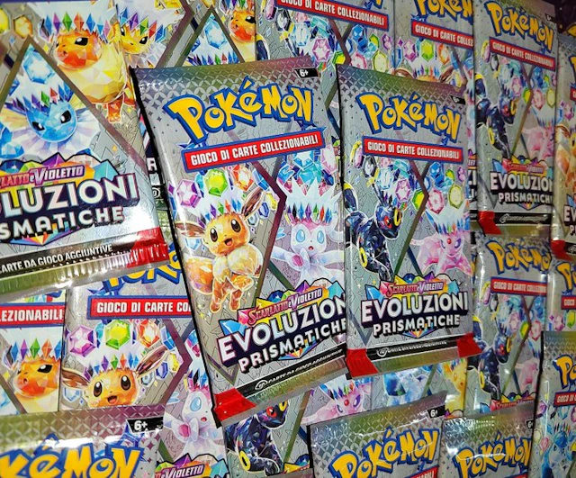 Pokémon - 10 Booster pack - Evoluzioni Prismatiche...