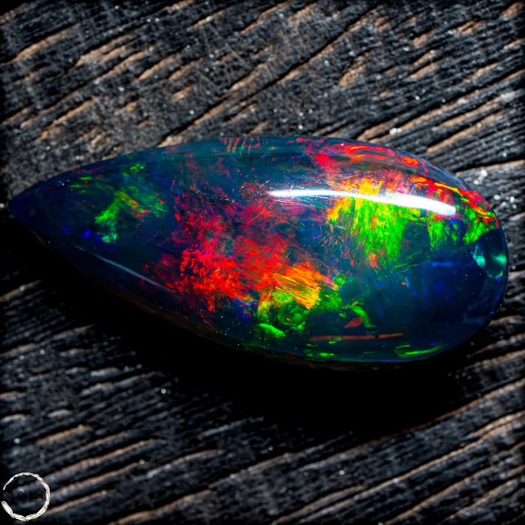 The finest Black Opal in glowing rainbow colors—a...