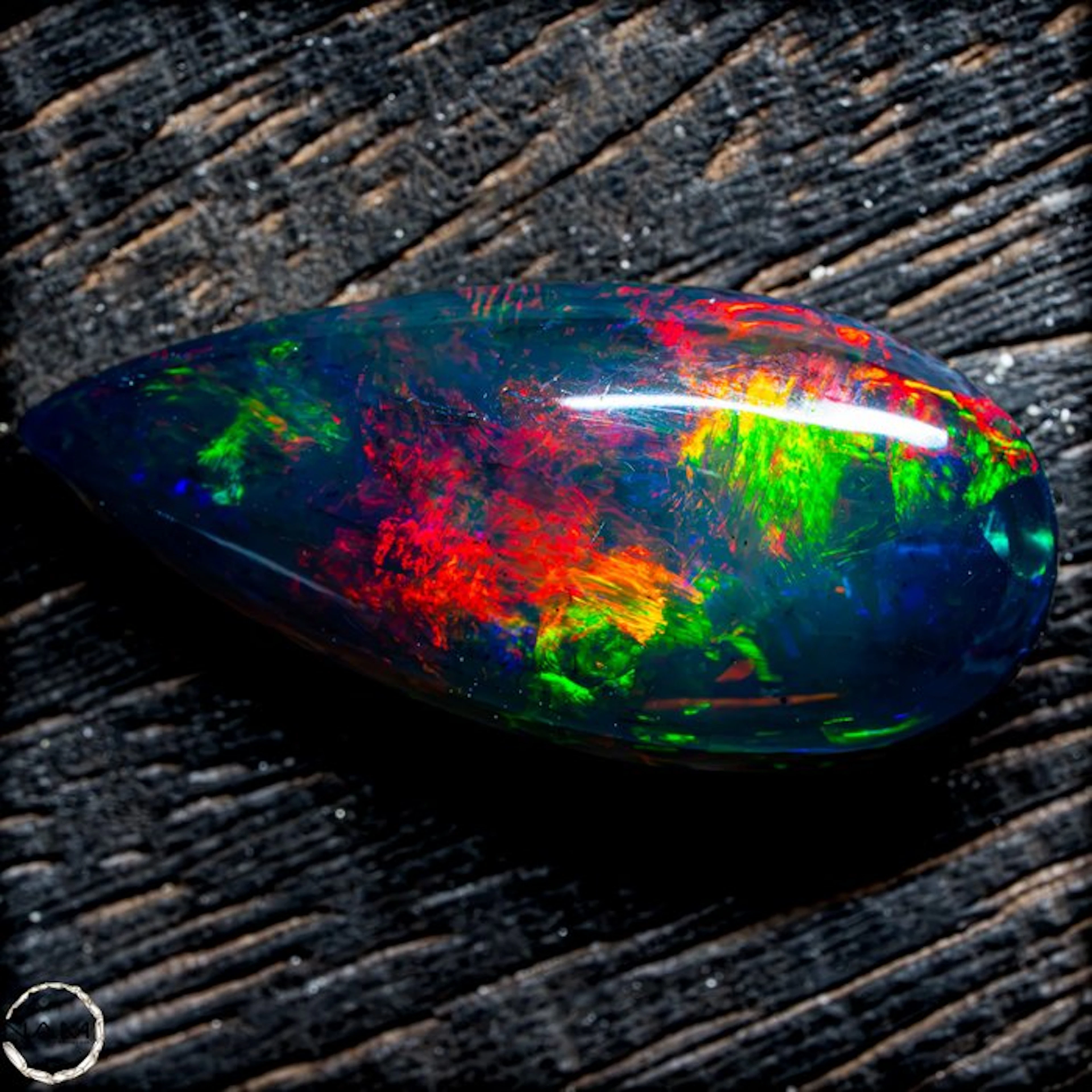 The finest Black Opal in glowing rainbow colors—a...