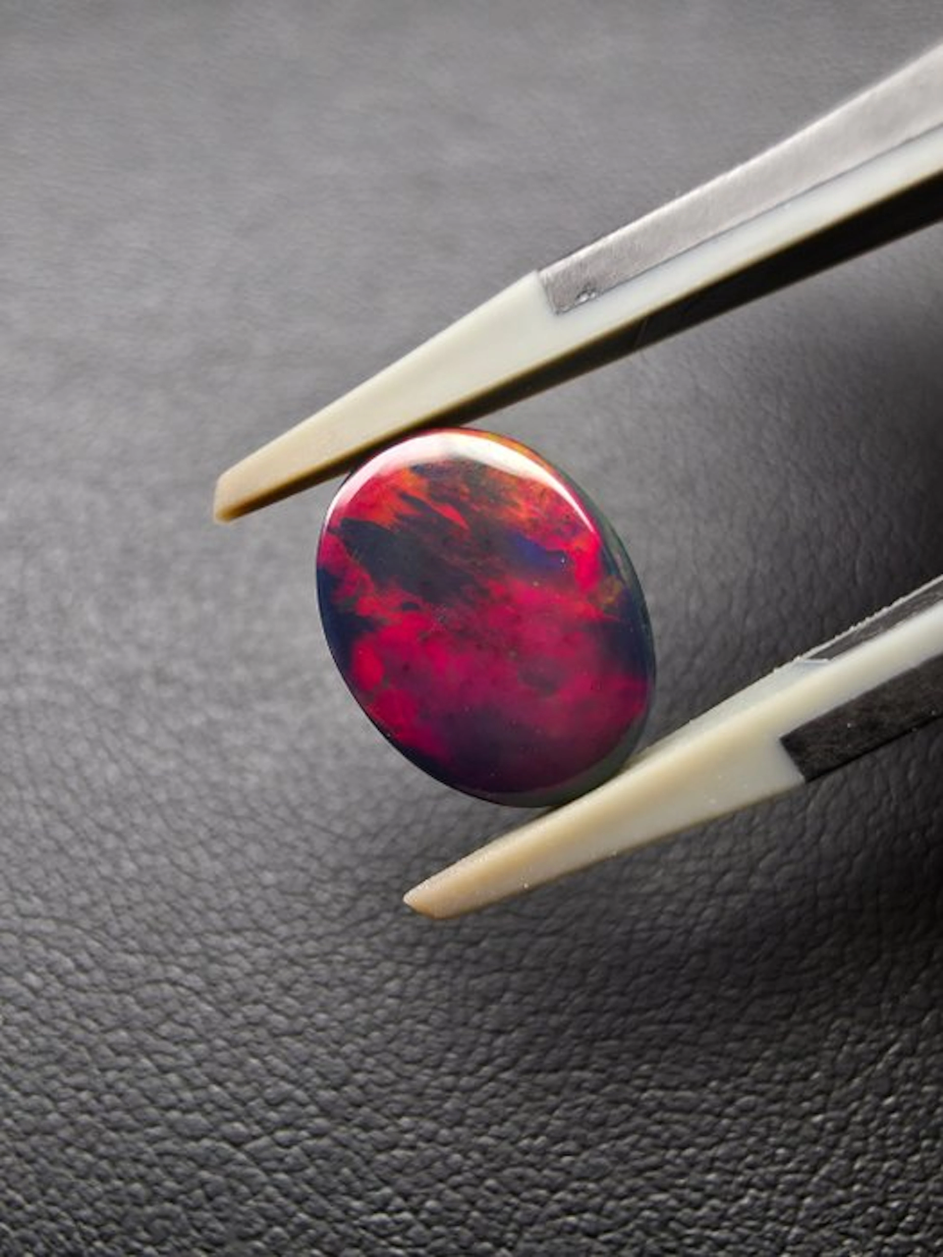 2.89 ct Black Opal Cabochon- 0.58 g