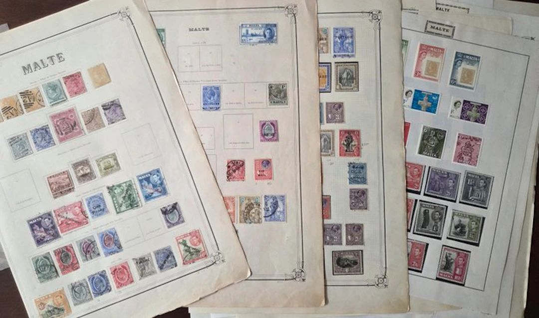 Malta - Lot unused and stamped on 16 album pages