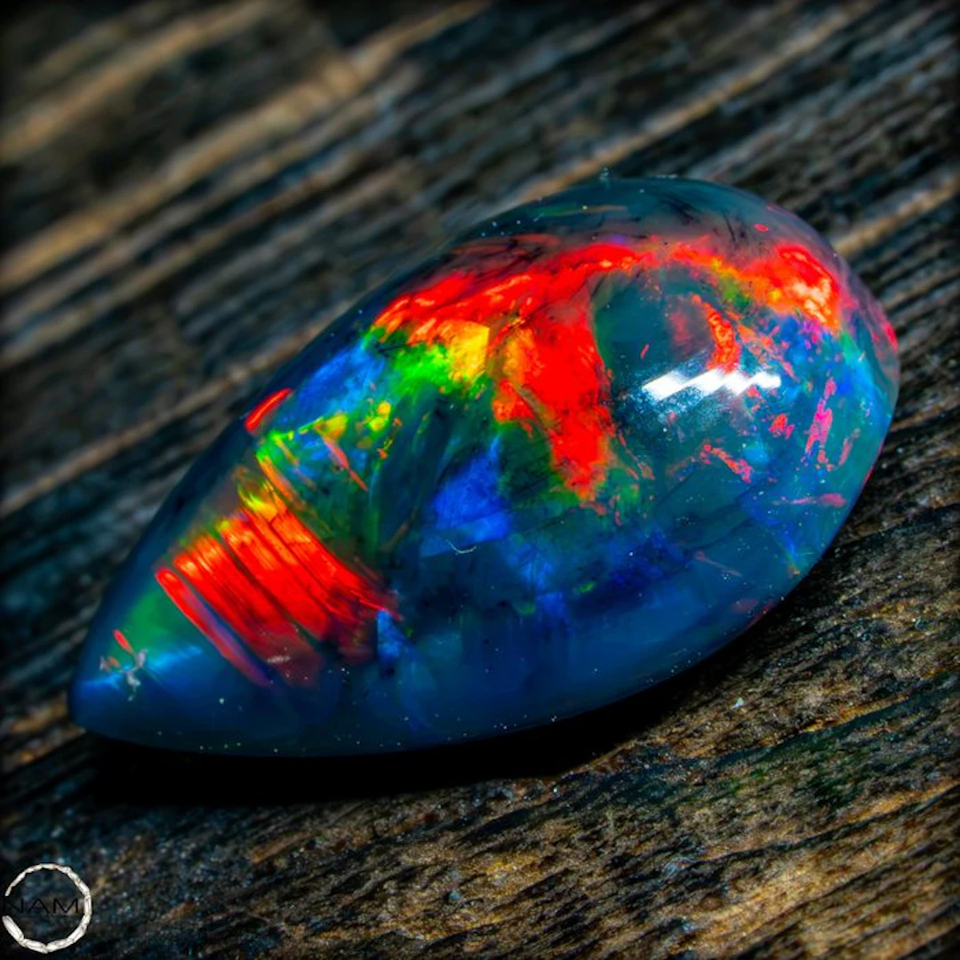 The finest Black Opal in glowing rainbow colors—a...