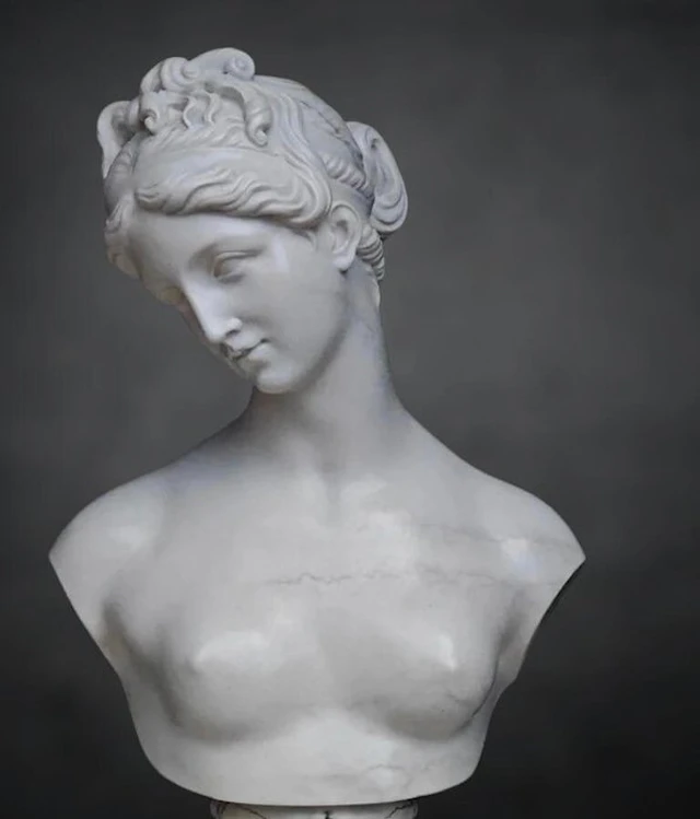 Hand-sculpted marble with a marble finish. Bust - 24 cm