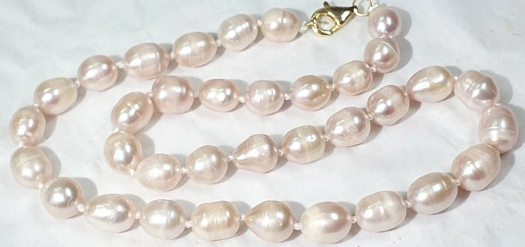 Natural Pink Freshwater Pearls - Symbol of Purity - 925...