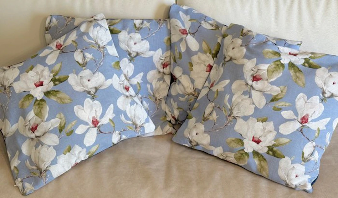 Elegant Sanderson-patterned cushion set with magnolia flower motif. - Cushion