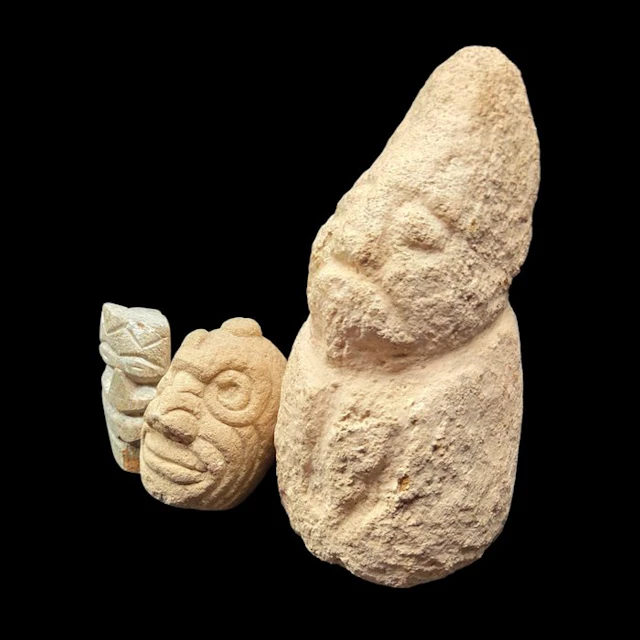 Curiosity cabinet: 3 Zoomorphic stone stele featuring...