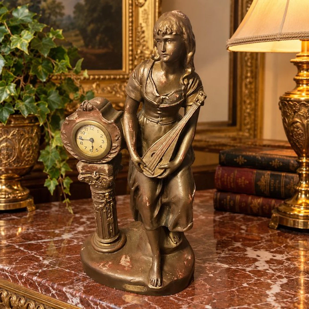 Figural mantel clock - D'après Moreau - bronze-patinated...