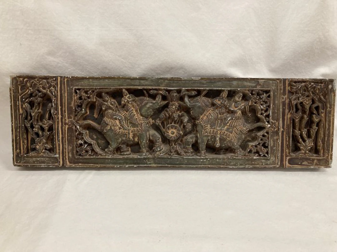 Fine carving in stone (slate) featuring elephants