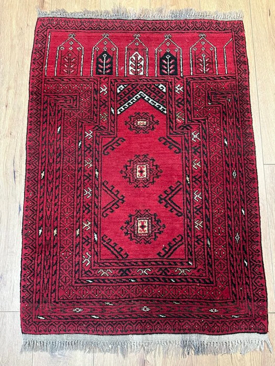 Hand-knotted Oriental prayer rug in the traditional...