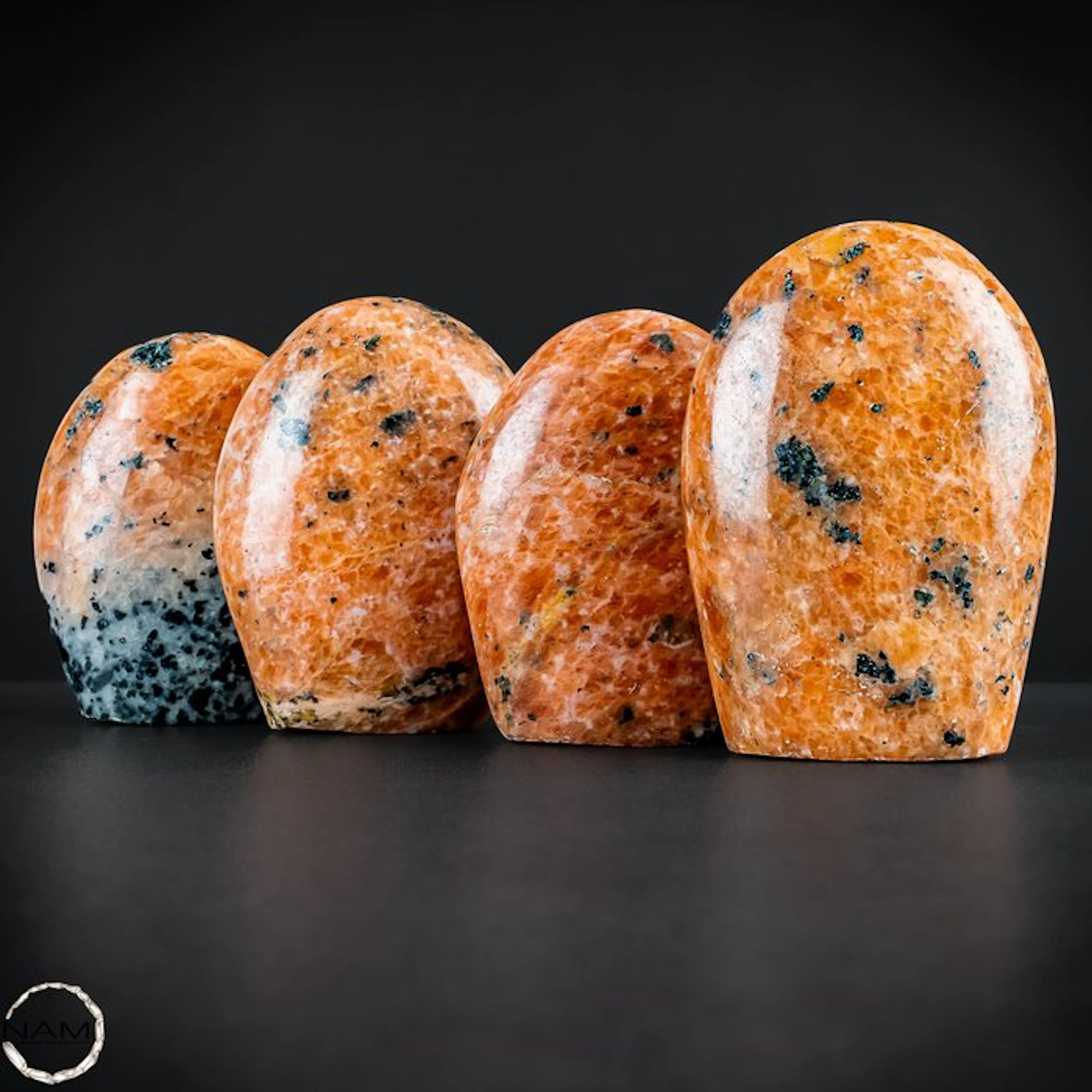 Orange calcite with black tourmaline – 4 hand-polished...